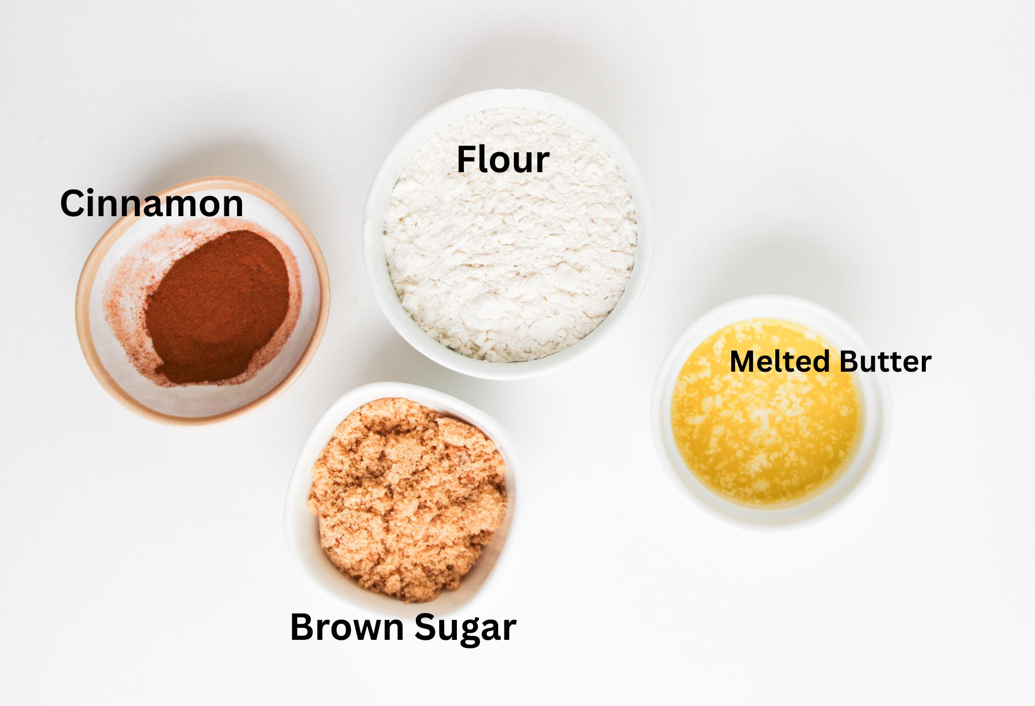 crumbly streusel topping ingredients including brown sugar, cinnamon, and butter.
