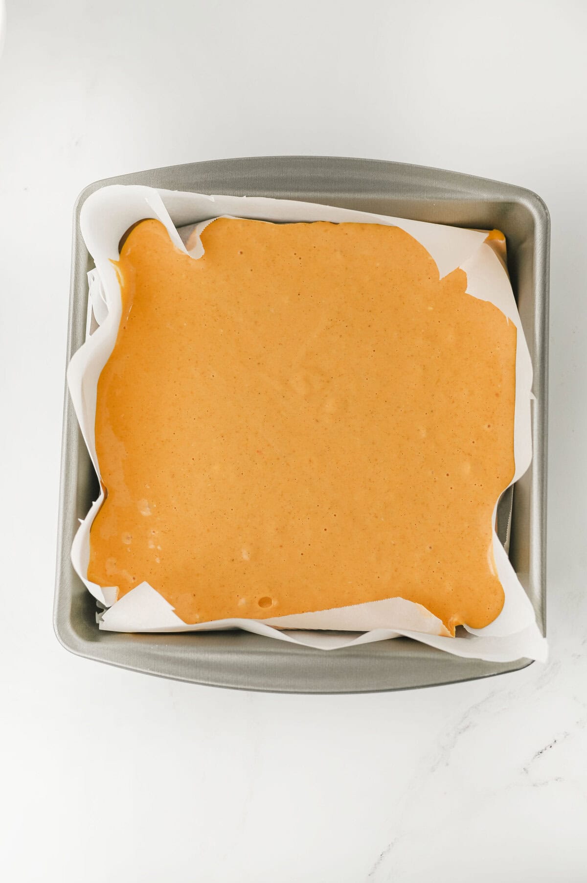 poured pumpkin mixture on top of brownie batter.