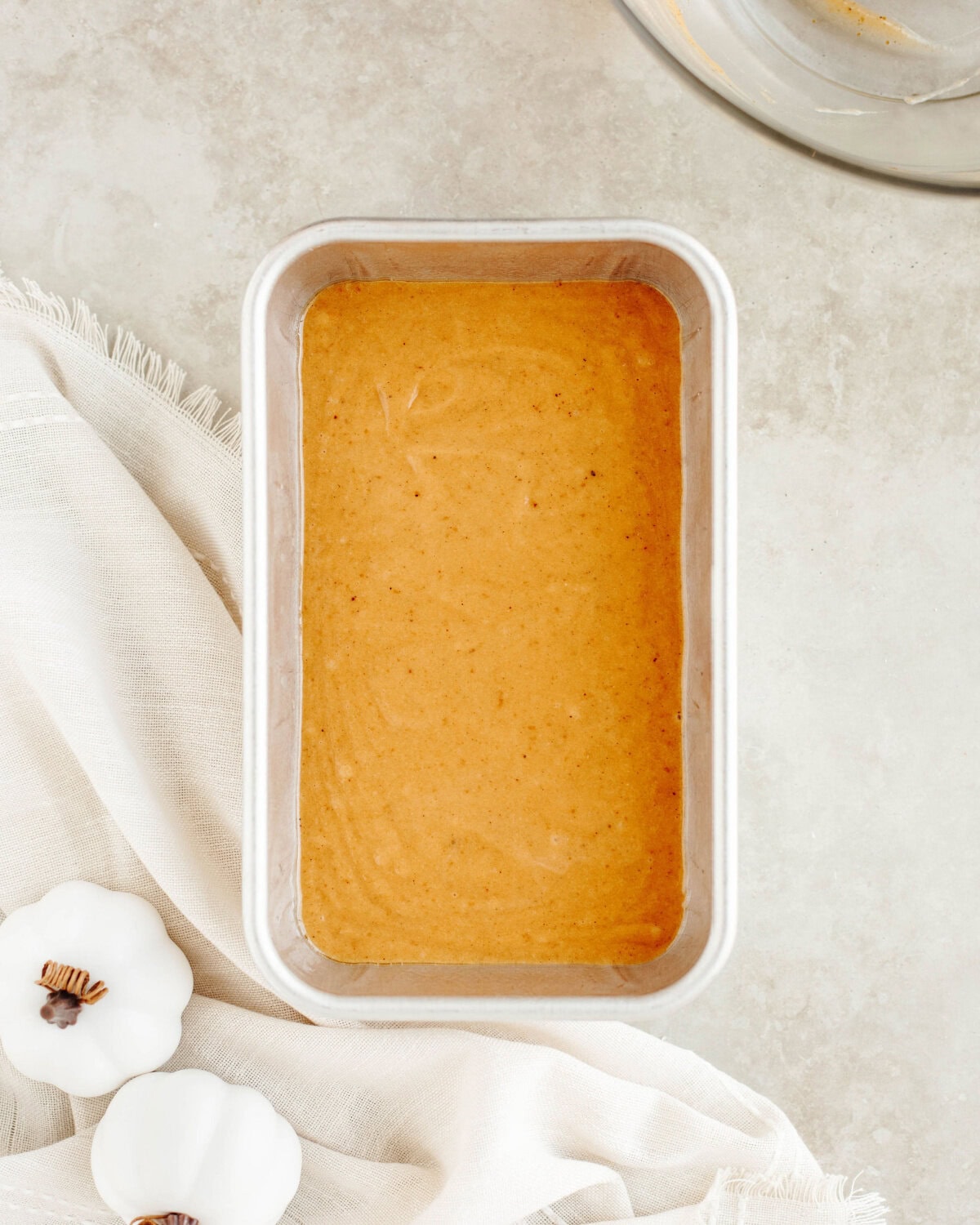 quick bread batter in a greased loaf pan.