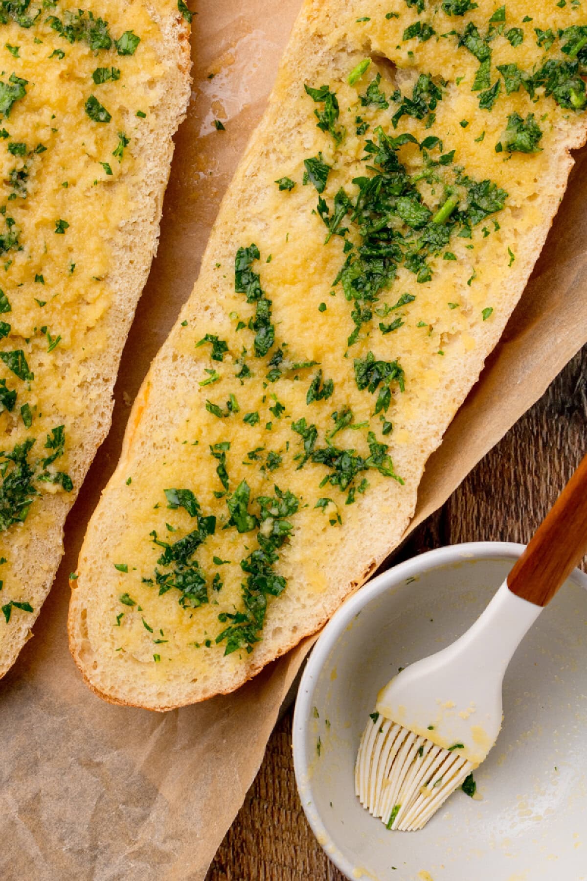 melted butter mixture brushed onto halves of french bread.