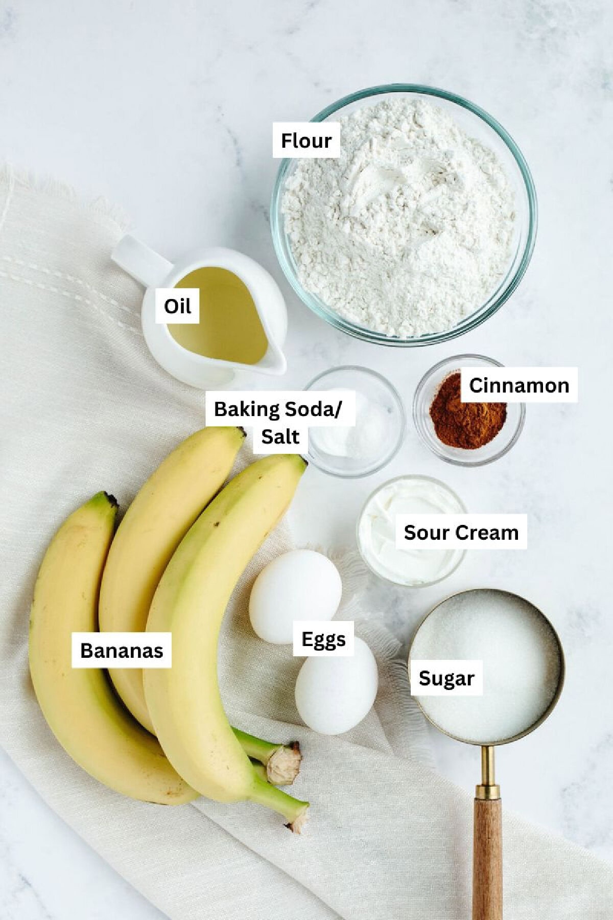 all the ingredients needed to make a loaf of snickerdoodle banana bread.