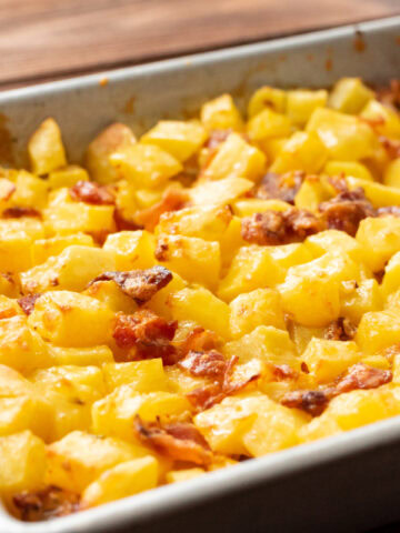 baked Mississippi Mud potatoes in a baking dish.