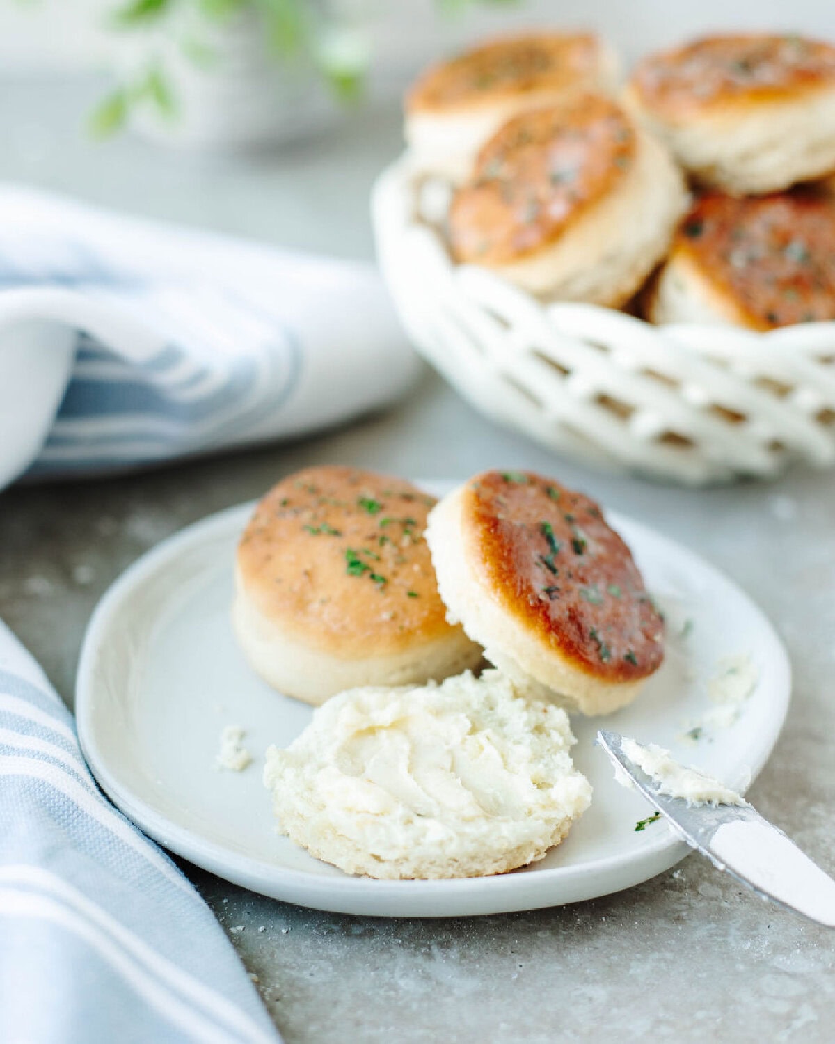 Melt-in-your-mouth 7 Up Biscuits, perfectly golden, arranged on a crisp plate for a cozy, homey touch.