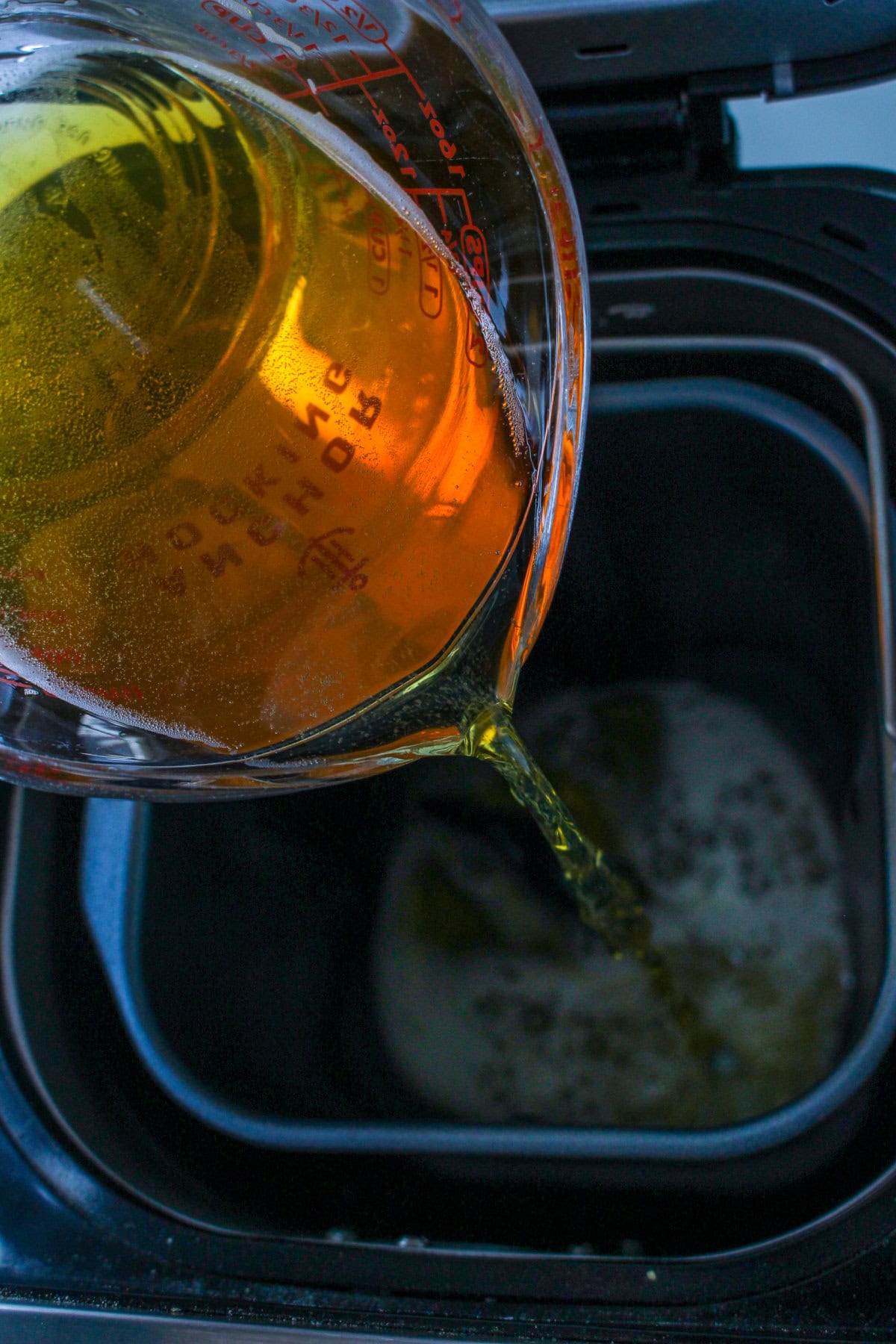 beer poured into a bread machine pan.