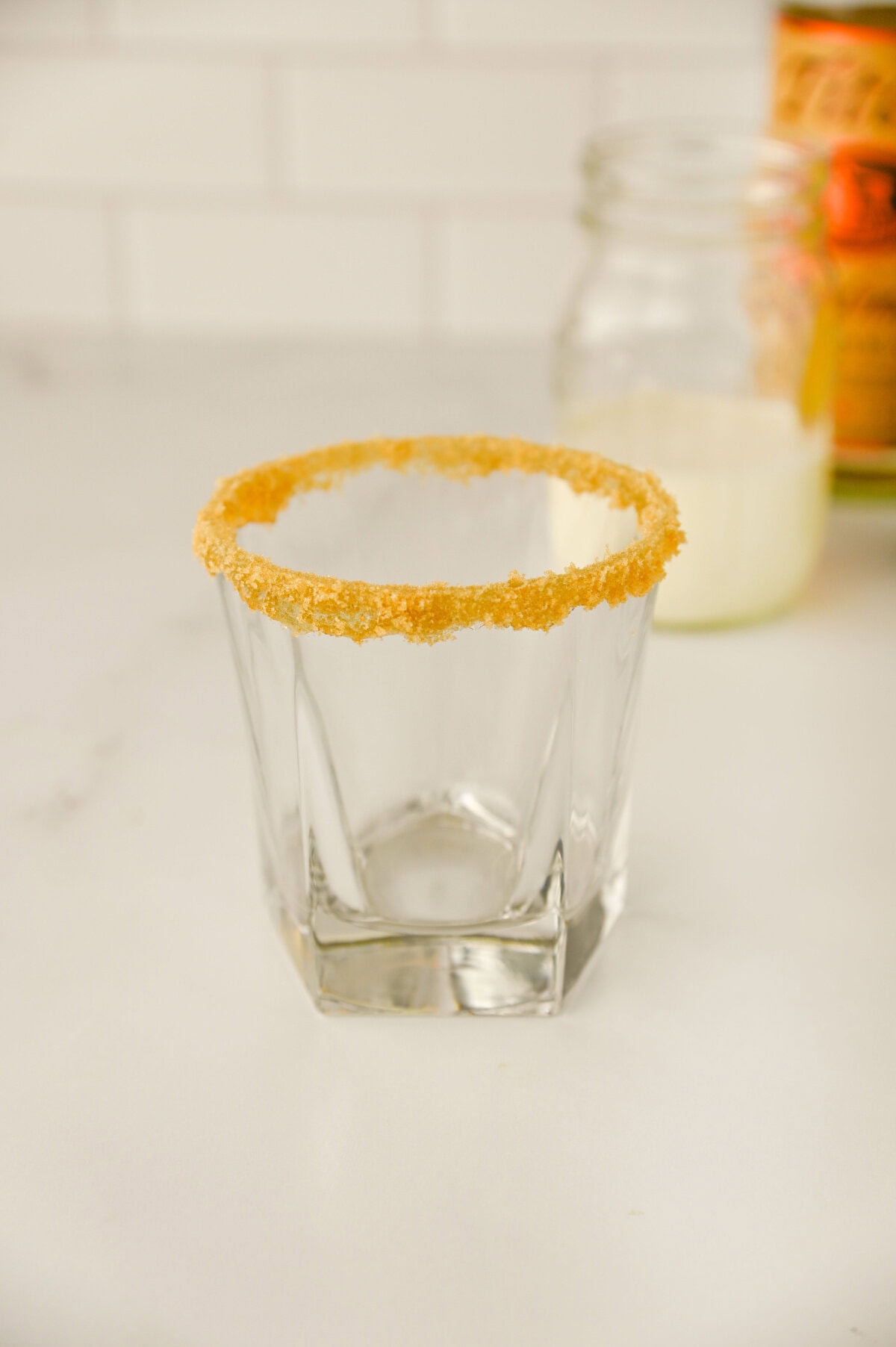 a corn syrup and brown sugar rimmed cocktail glass.