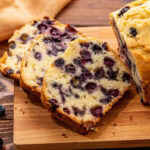 Easy homemade blueberry bread loaf sliced and ready to serve.