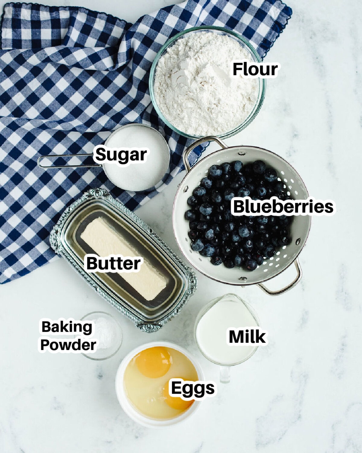 all the ingredients needed to make blueberry quick bread.