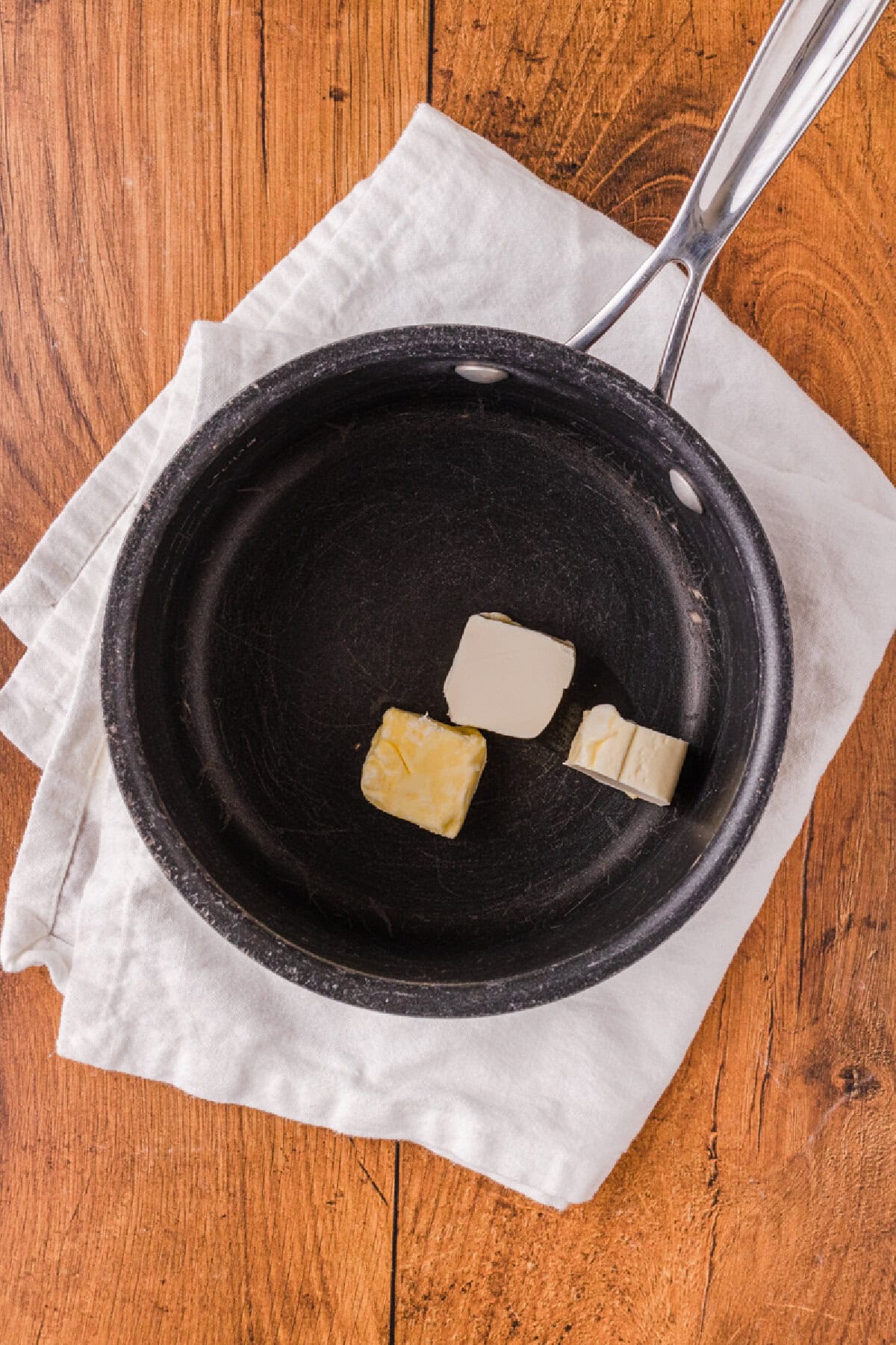 butter melting in a saucepan.