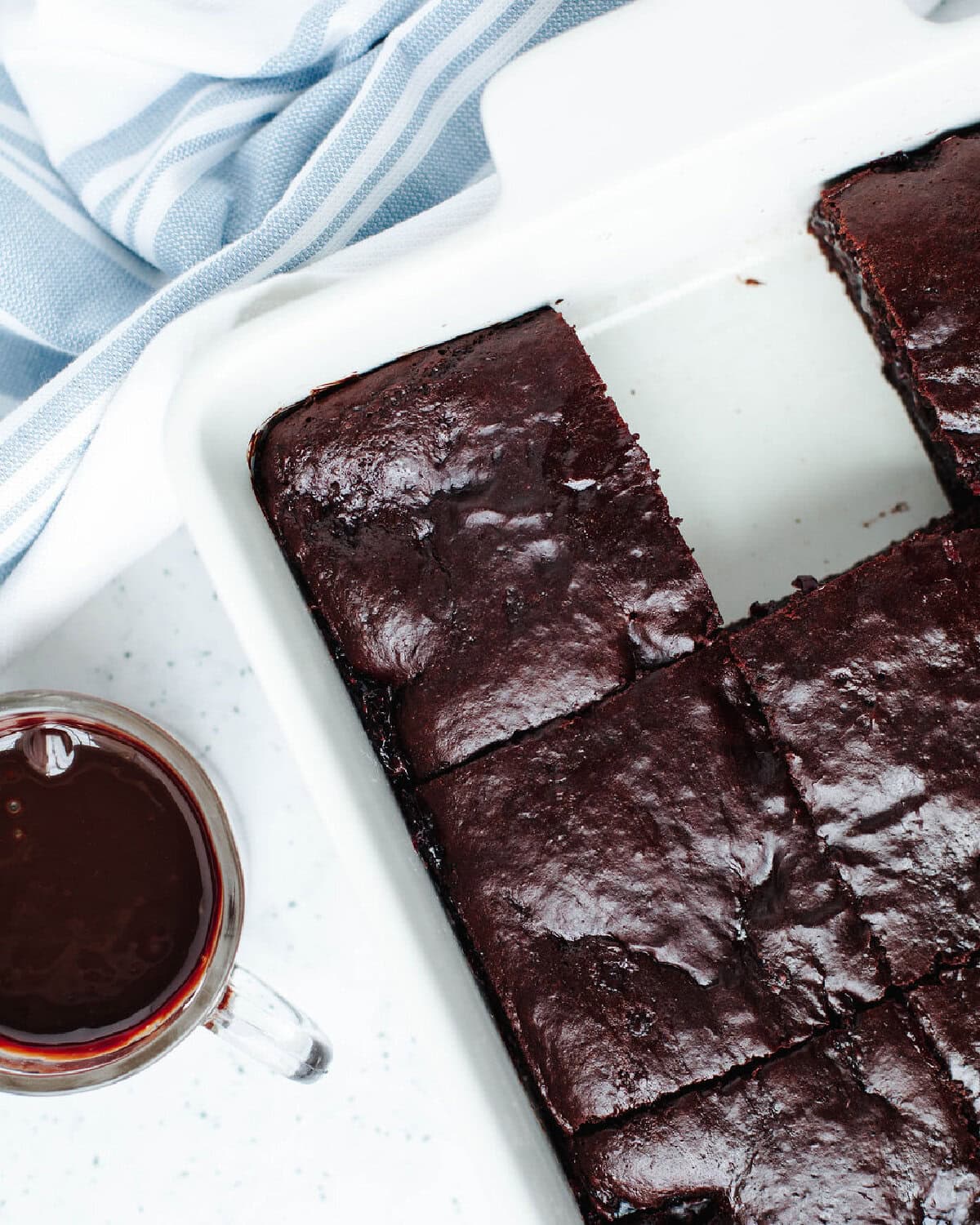 Chocolate raspberry dump cake baked in a 9x13 pan with a soft, gooey texture.