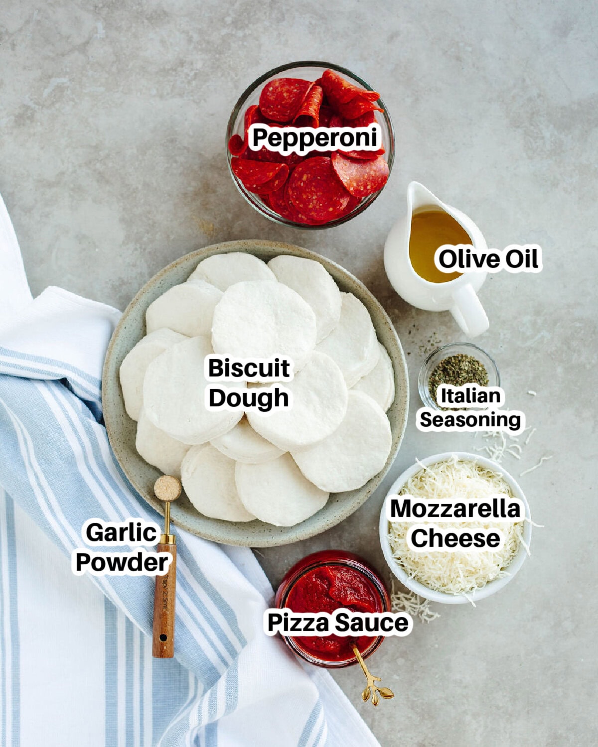 all the ingredients needed to make pull apart pizza bread.