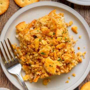 Close-up of creamy ritzy chicken casserole with buttery cracker topping.