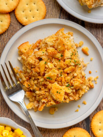 Close-up of creamy ritzy chicken casserole with buttery cracker topping.