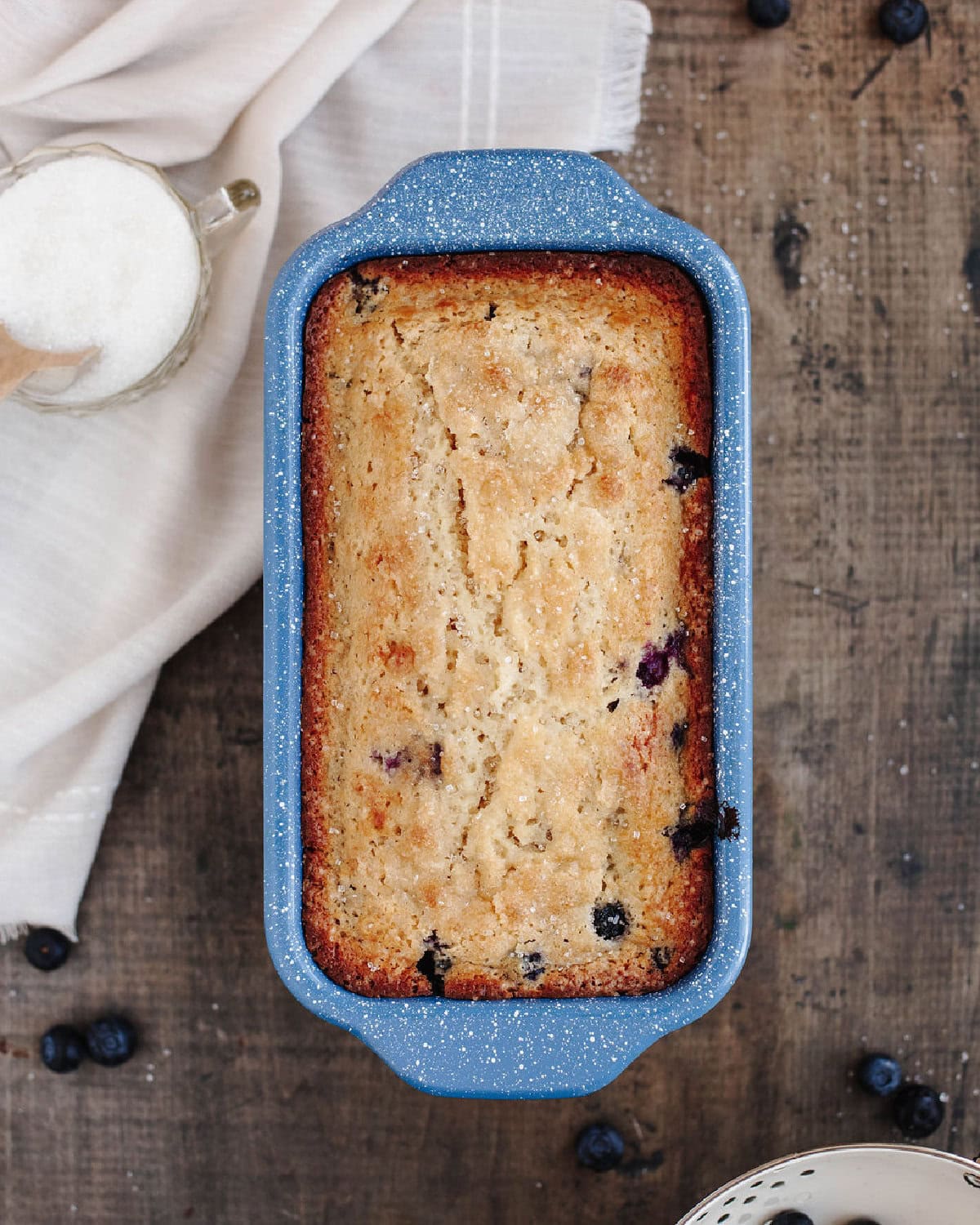 A loaf of baked blueberry muffin bread from the oven.