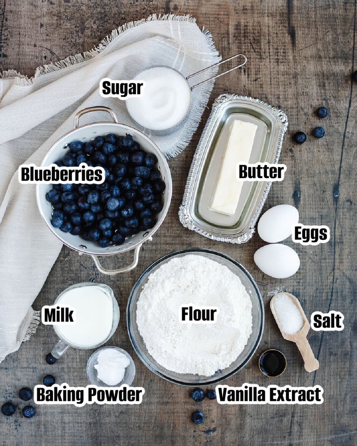 All the ingredients needed to make a loaf of Blueberry Muffin Bread.