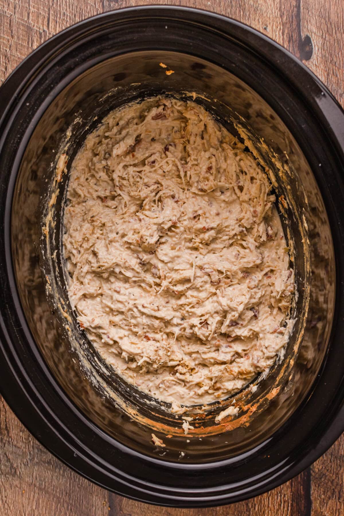 Shredded chicken with cream cheese and bacon.