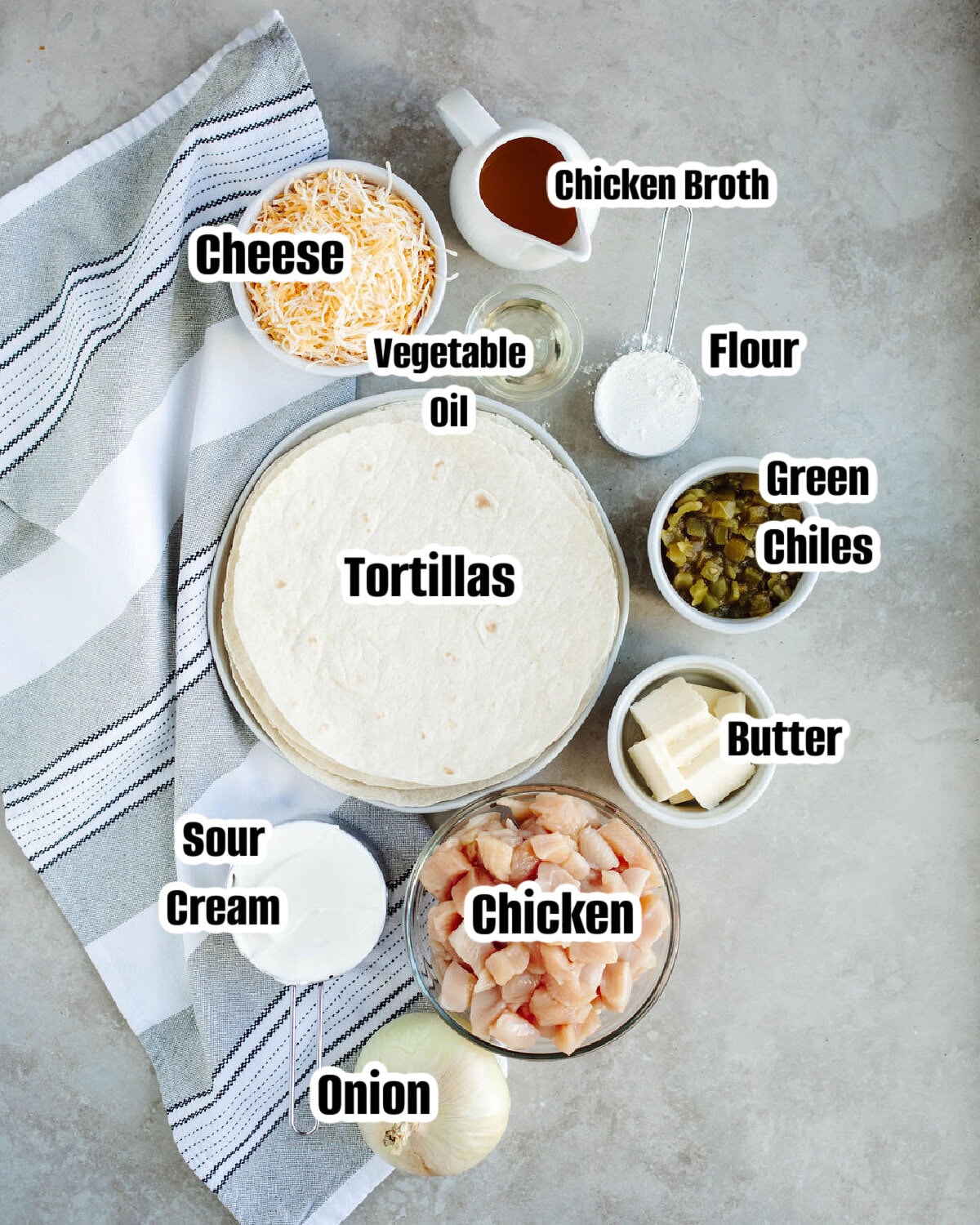 All the ingredients needed to make sour cream chicken enchiladas.