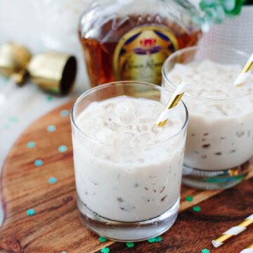A creamy Kahlua and whiskey cocktail over ice in a glass.