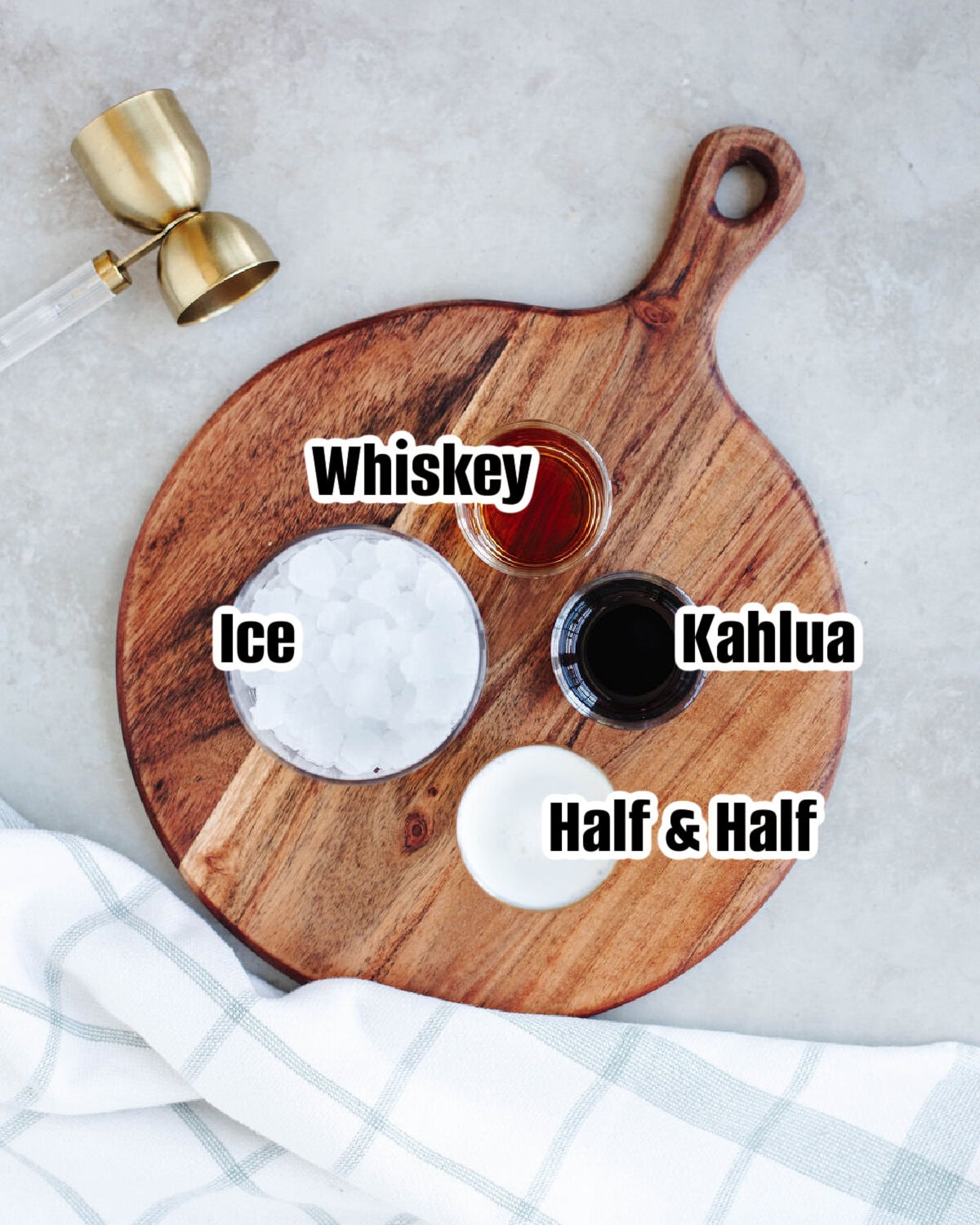 All the ingredients needed to make a Kahlua White Leprechaun Cocktail.