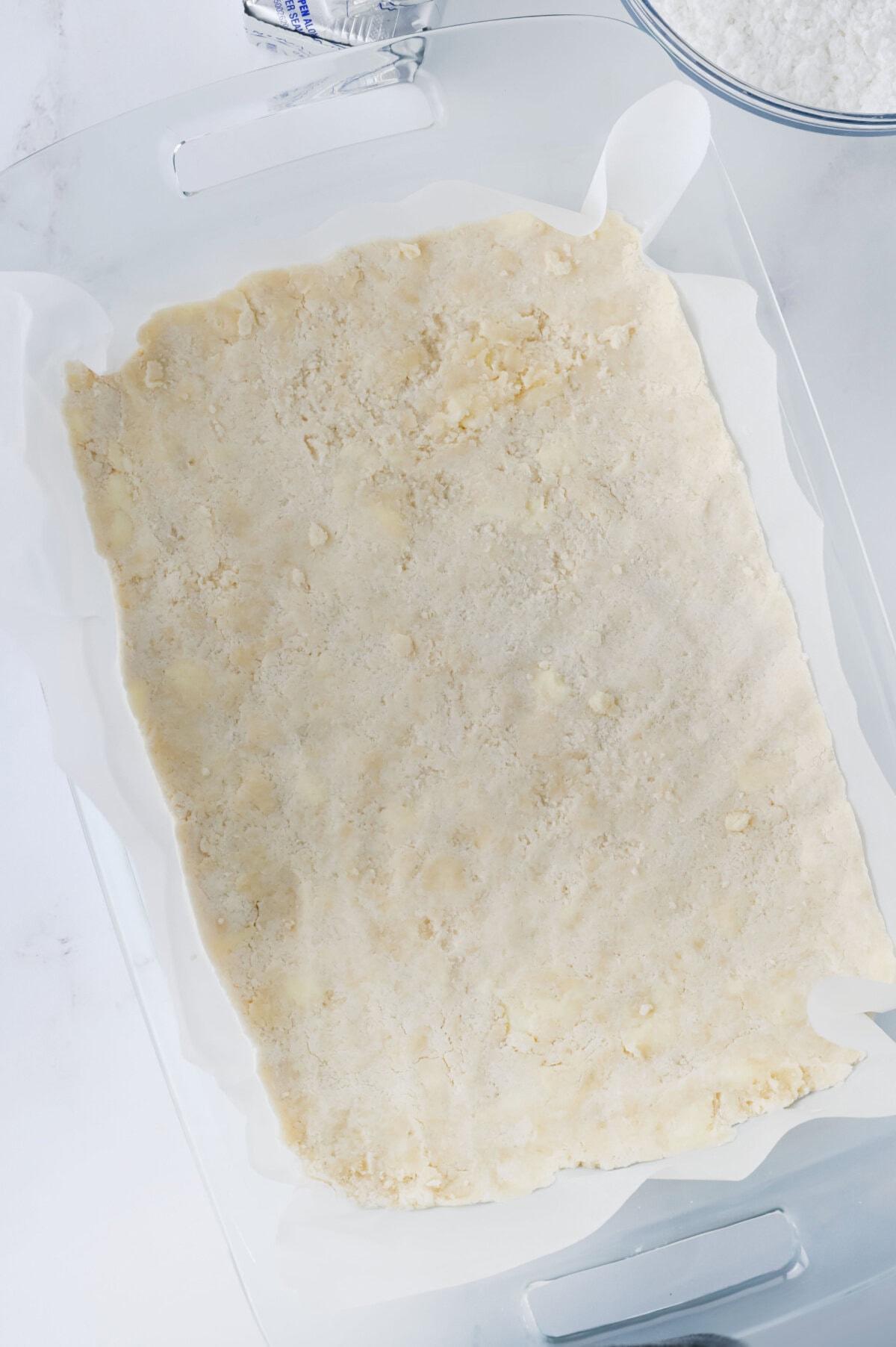 crumbly crust pressed into 9x13 baking pan.