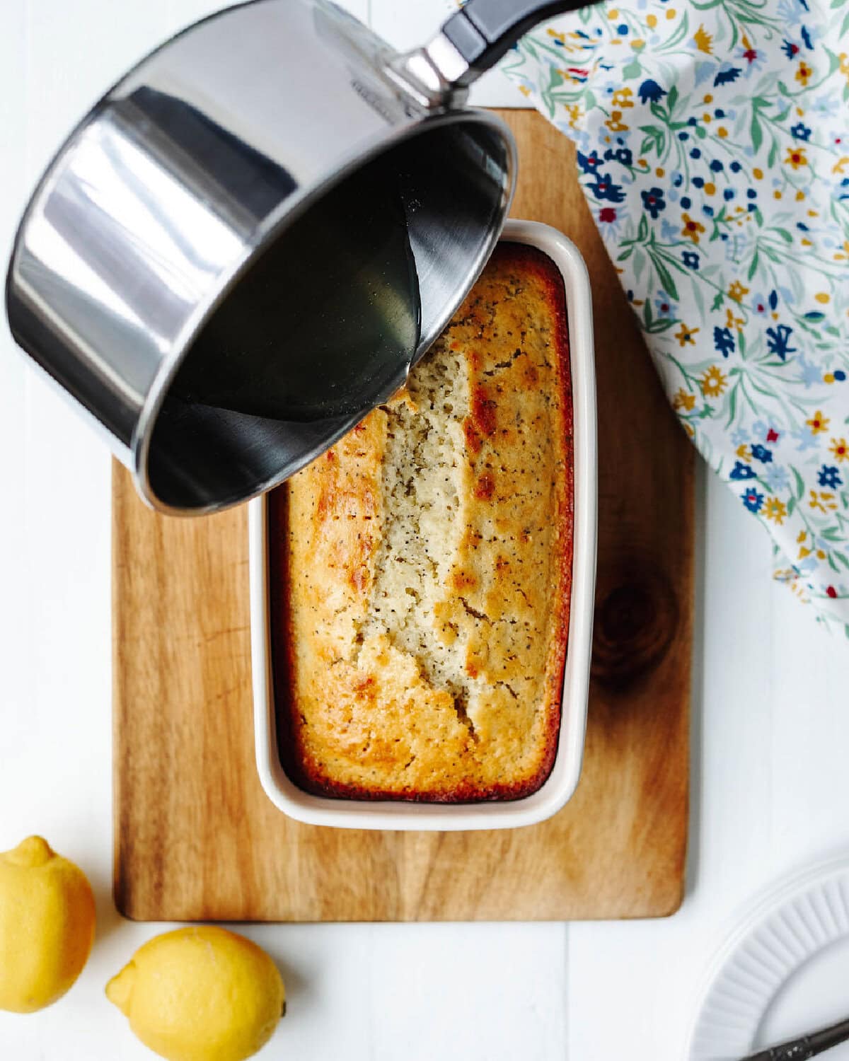 Glaze poured on top of a quick bread loaf.
