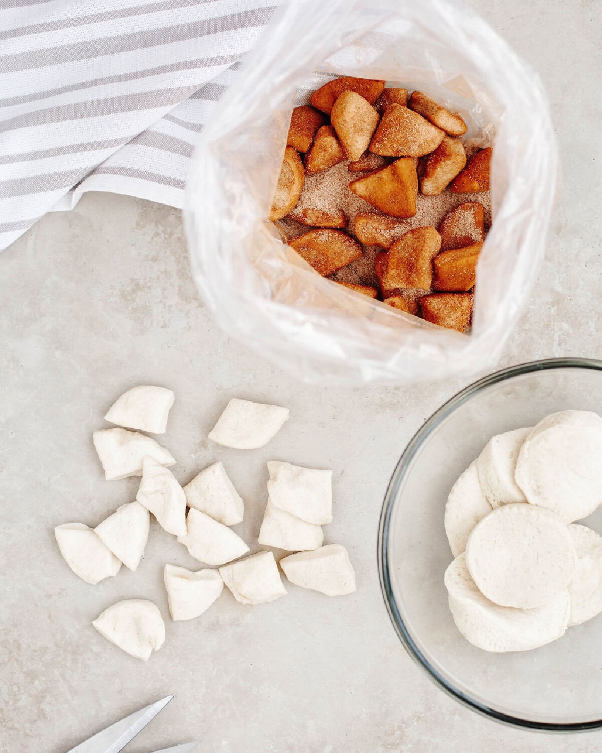 biscuits quartered and coated in cinnamon sugar mixture.