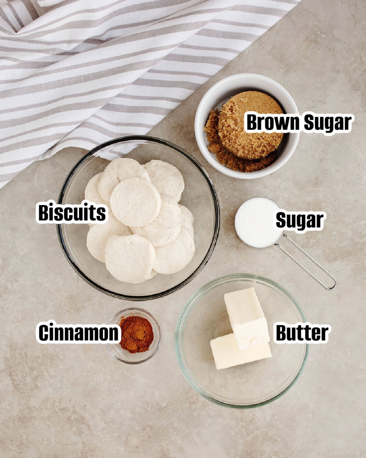 all the ingredients needed to make monkey bread in muffin tins.