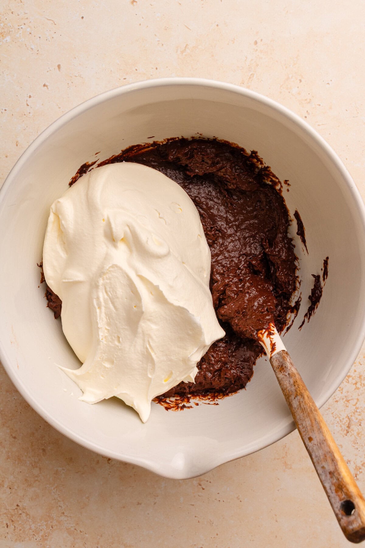 Cool whip folded into pudding mixture.