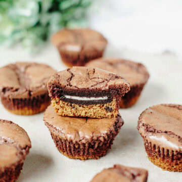 Stacked slutty brownie cups ready to serve.