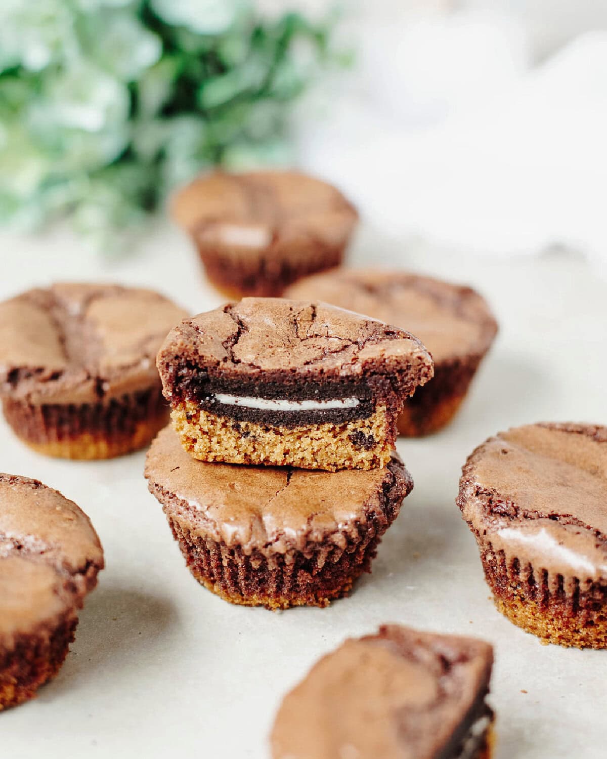 Stacked slutty brownie cups ready to serve.
