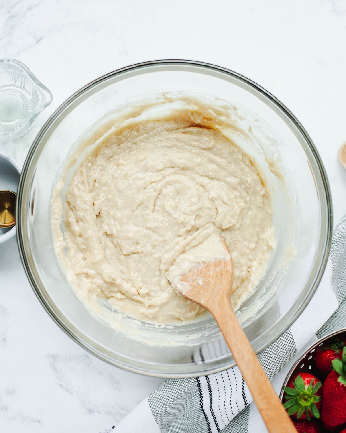 Quick bread batter mixed in a large bowl before baking.