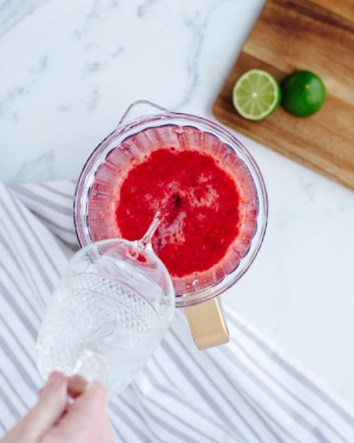 Coconut Malibu Rum poured into a pitcher.