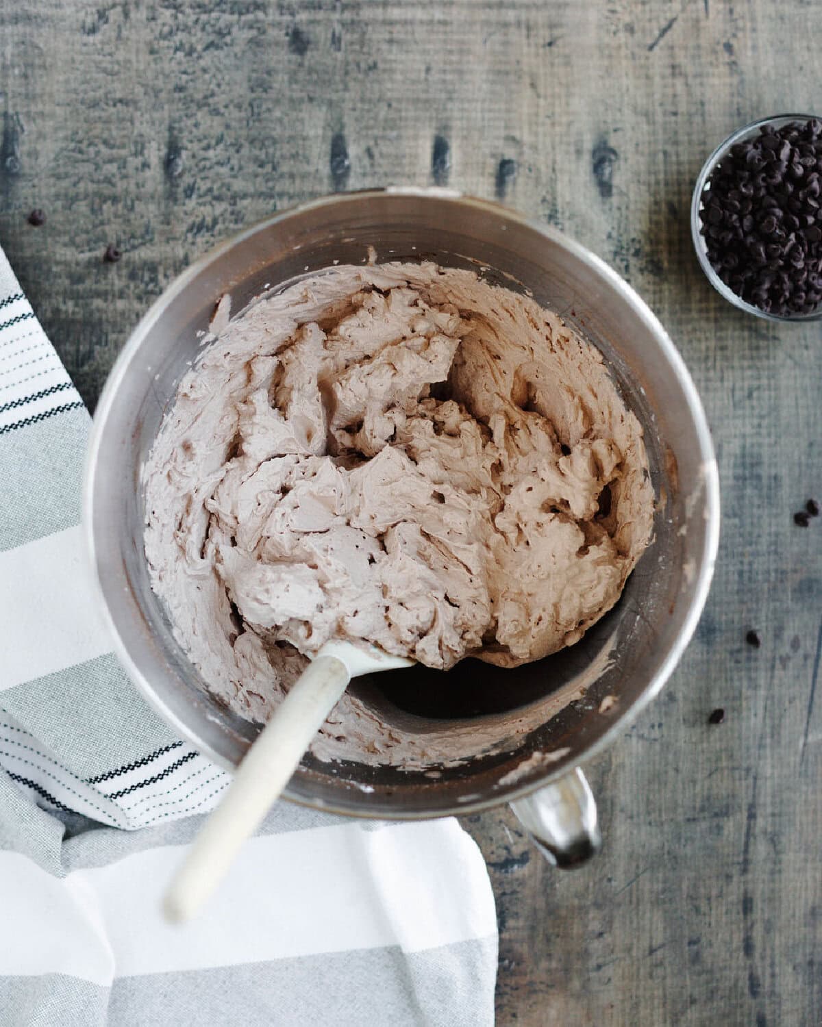 Kahlua whipped cream prepared in a mixing bowl.