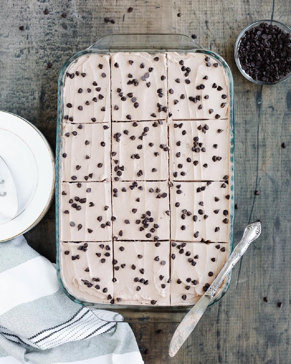 Sliced Kahlua poke cake ready to serve from a 9x13 baking pan.