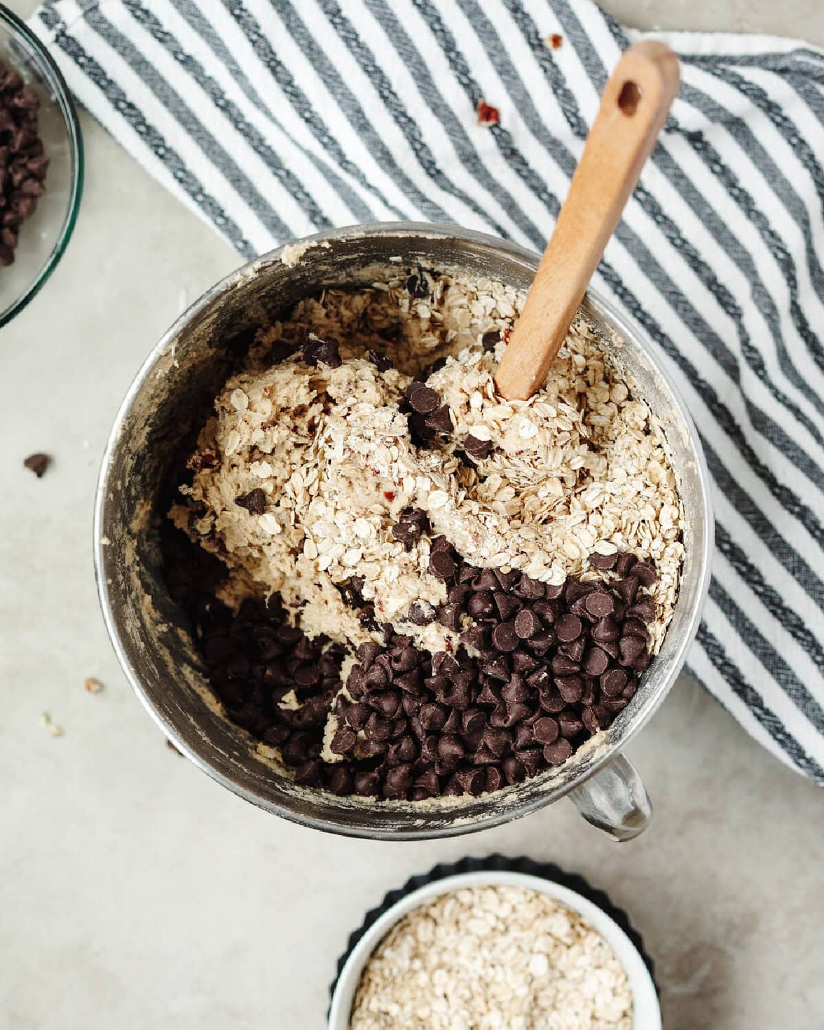 Chocolate chips and rolled oats folded into cookie dough.