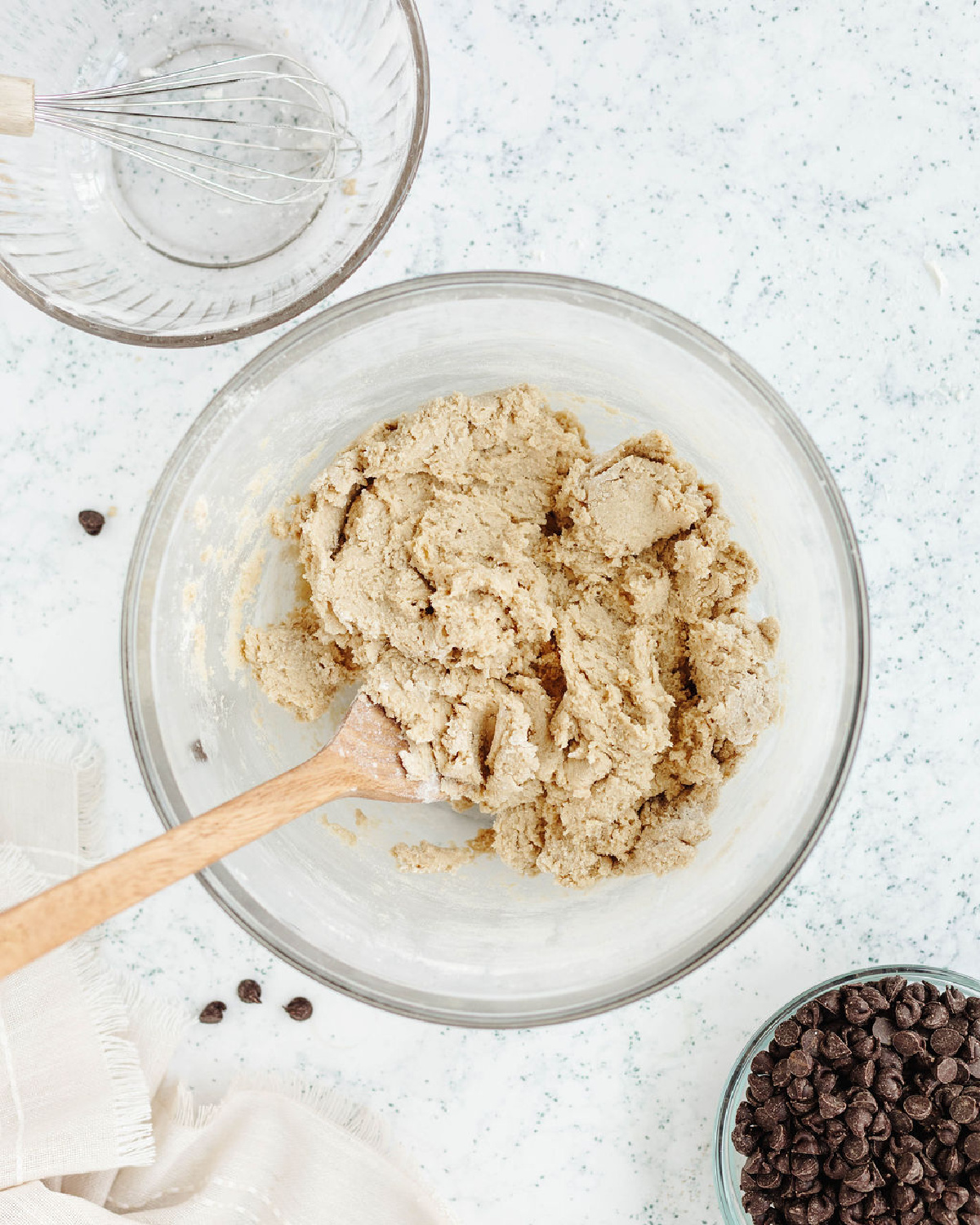 Butter, brown sugar, and powdered sugar creamed together in a mixing bowl.