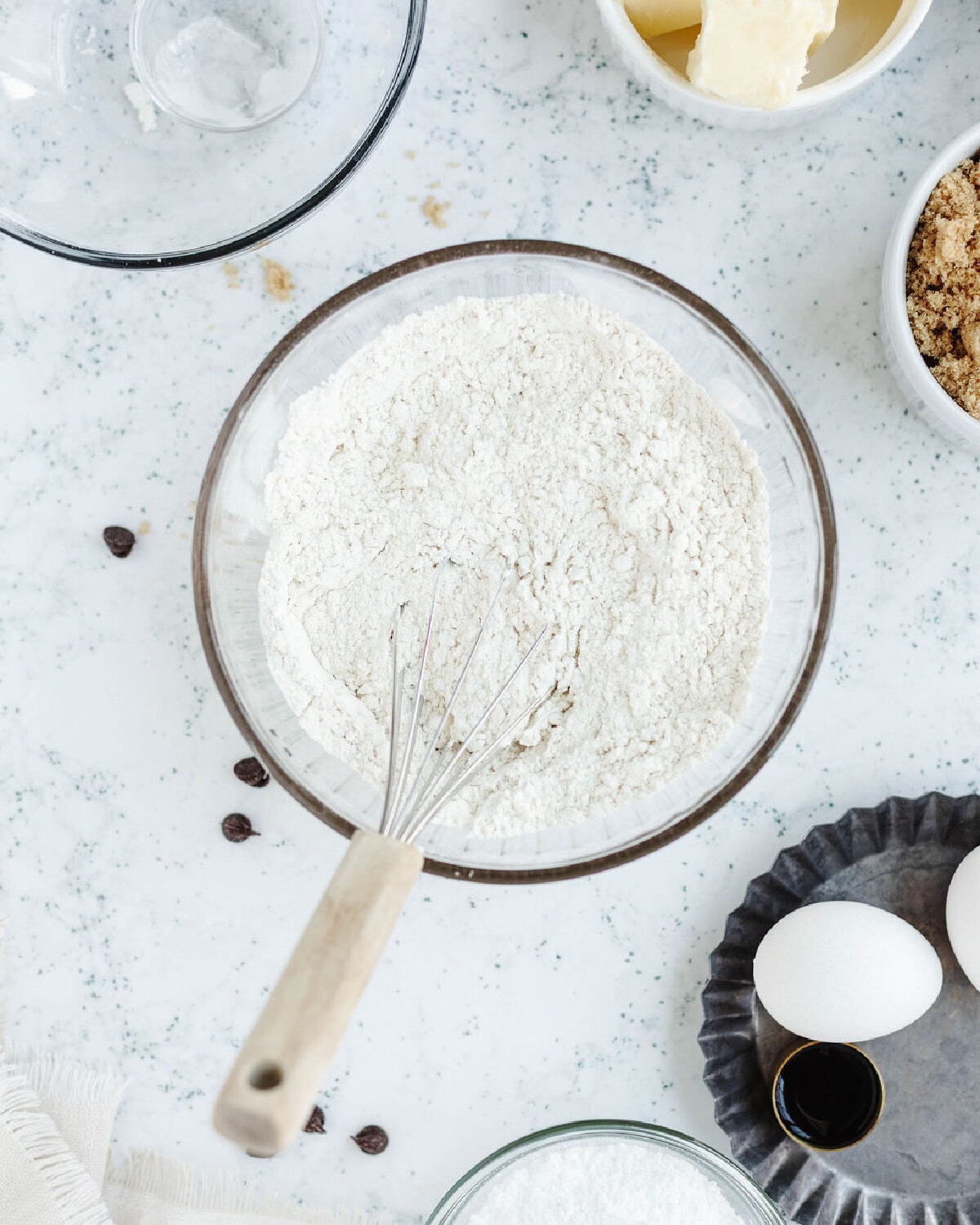 Flour, baking soda, and salt whisked together in a medium mixing bowl.