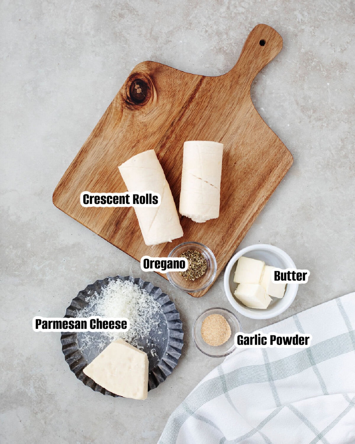 Simple ingredients needed to make garlic cheese crescent rolls.