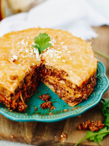Baked instant pot enchilada casserole ready to serve from a plate.