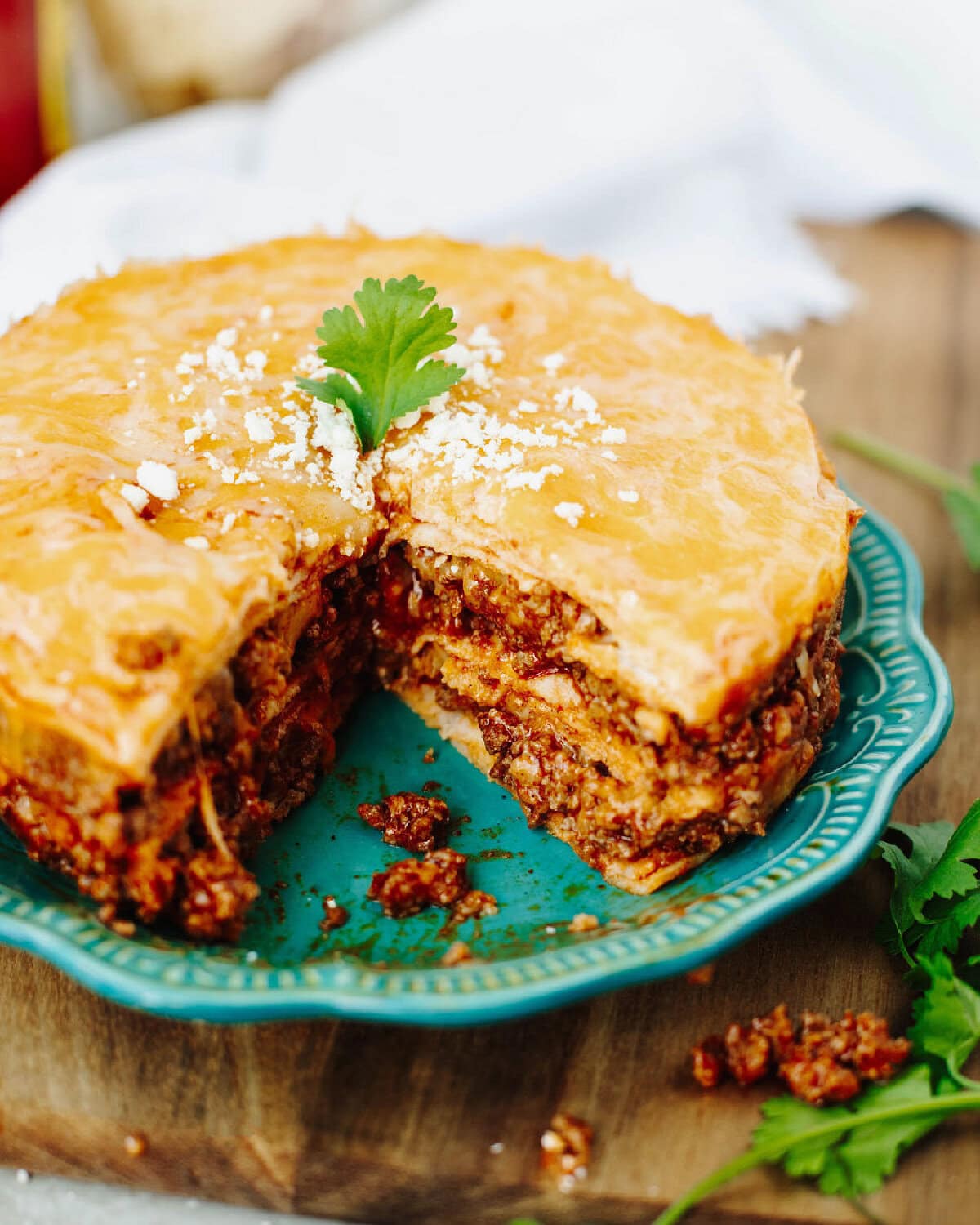 Baked instant pot enchilada casserole ready to serve from a plate.