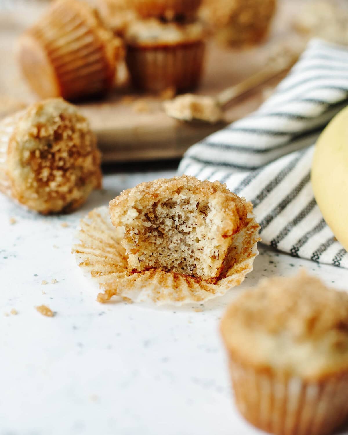 soft mini banana muffins showing fluffy texture inside.