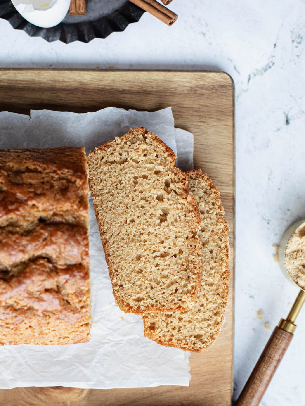 Close-up of soft sliced loaf on a serving platter.