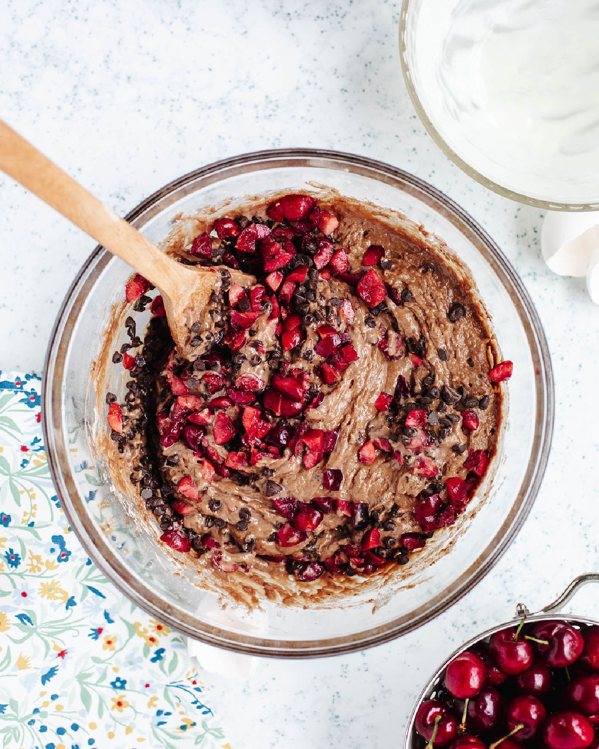 Diced cherries folded into chocolate muffin batter.