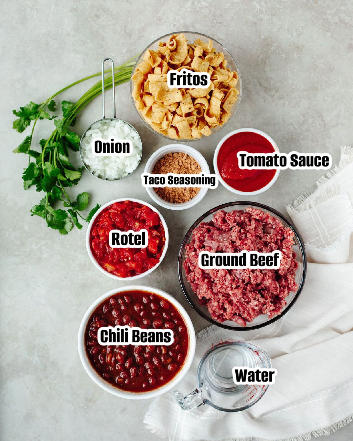 All the ingredients needed to make crockpot frito chili pie.