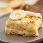 An up close look at homemade banana pudding served on a plate.