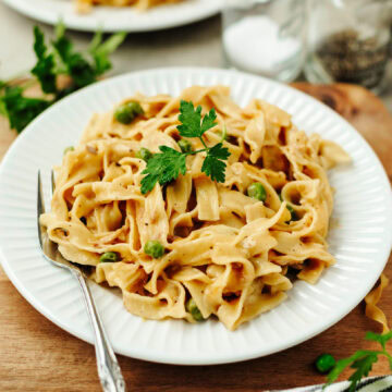 Creamy tuna casserole served on a white plate.