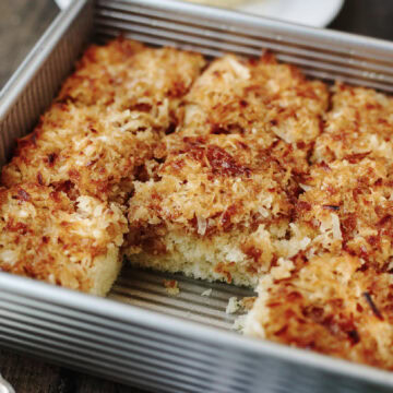 Lazy Day Cake baked in an 8x8 baking pan and ready to serve.