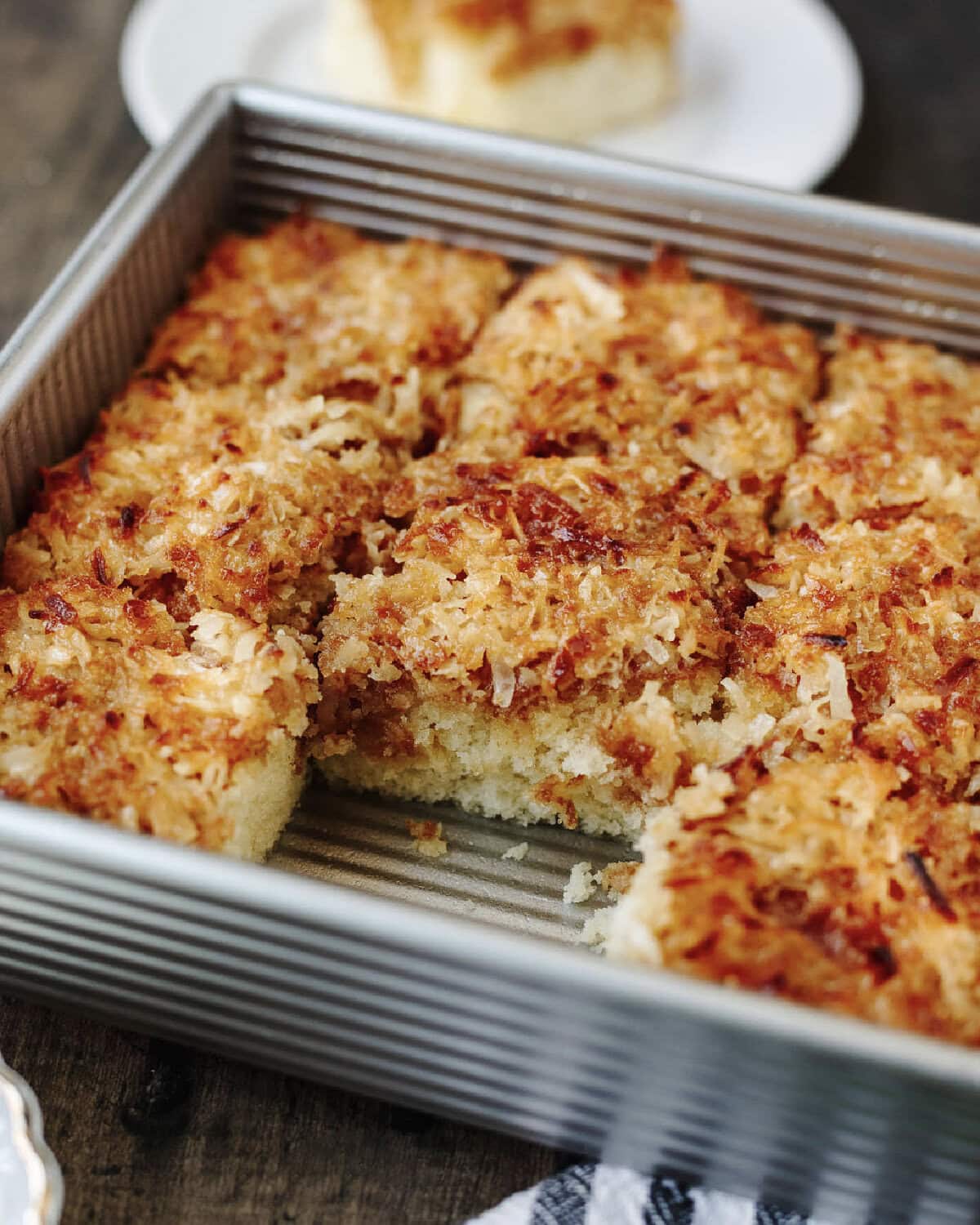 Lazy Day Cake baked in an 8x8 baking pan and ready to serve.
