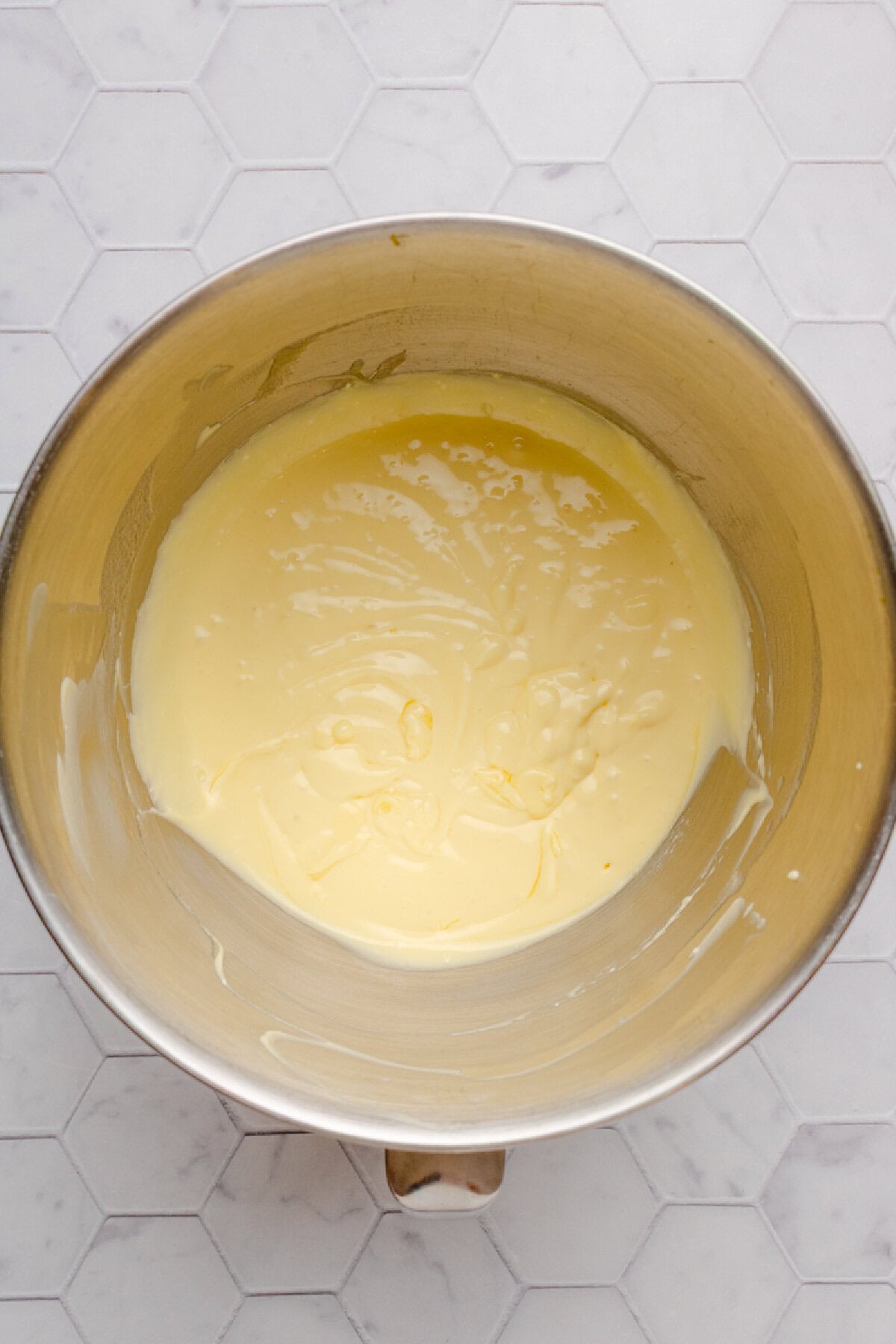 Cake mix stirred into egg and melted butter to form a cake batter.