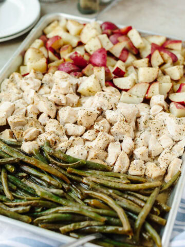 Baked sheet pan Ranch chicken with potatoes and green beans.
