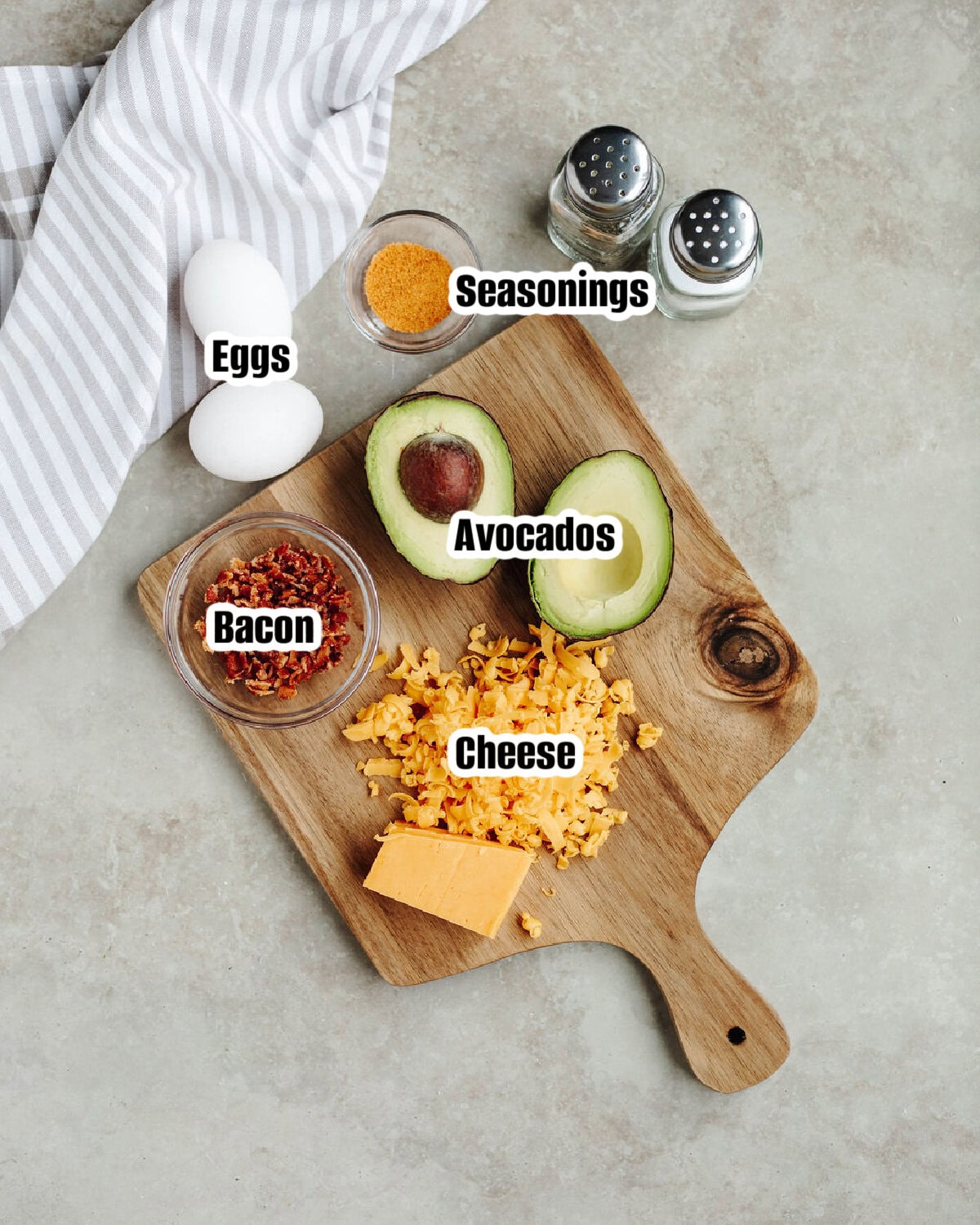 All the ingredients needed to make breakfast stuffed avocados.